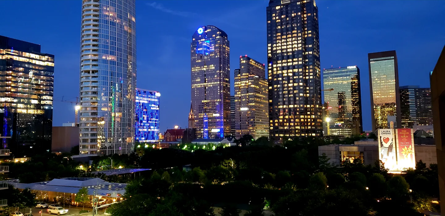 Klyde Warren Park and the Dallas skyline at dusk, photographed 2018